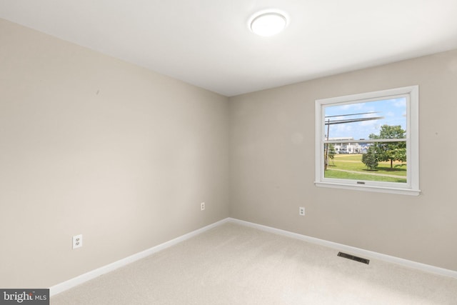 1003 Cedar Park Rd, Annapolis, MD 21401 - spare room featuring light carpet and baseboards