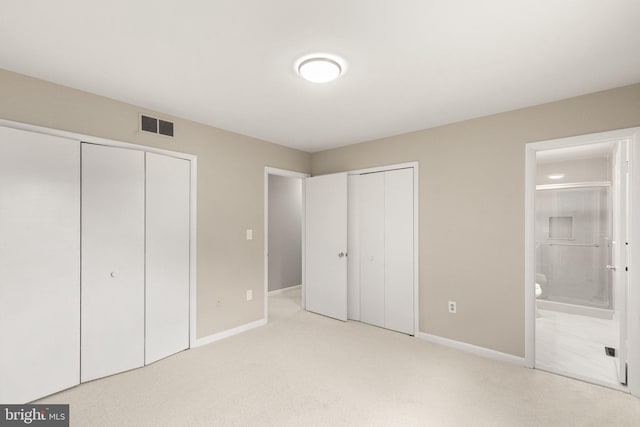 1003 Cedar Park Rd, Annapolis, MD 21401 - unfurnished bedroom with two closets, carpet flooring, and ensuite bathroom