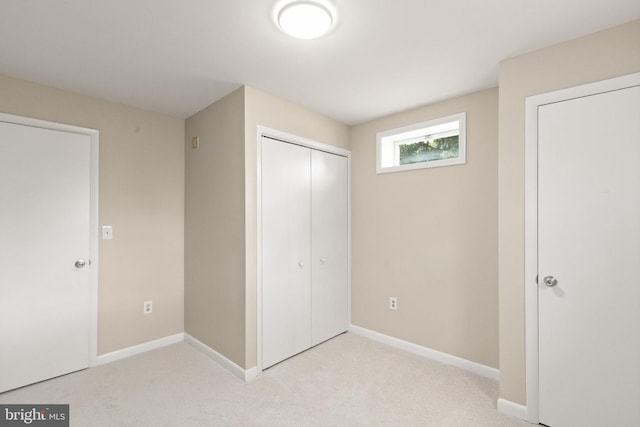 1003 Cedar Park Rd, Annapolis, MD 21401 - unfurnished bedroom with light colored carpet and a closet