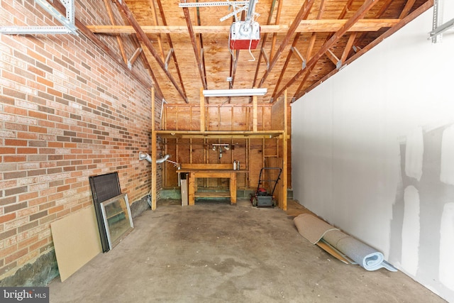 1003 Cedar Park Rd, Annapolis, MD 21401 - basement featuring brick wall and a garage
