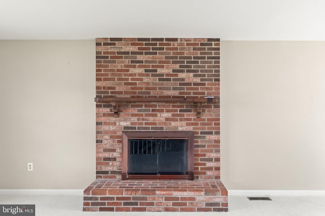 1003 Cedar Park Rd, Annapolis, MD 21401 - detailed view of carpet flooring and a brick fireplace