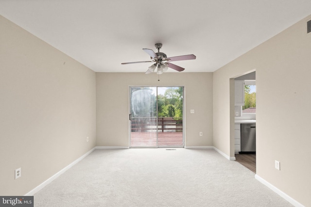 1003 Cedar Park Rd, Annapolis, MD 21401 - empty room with ceiling fan, light carpet, and plenty of natural light