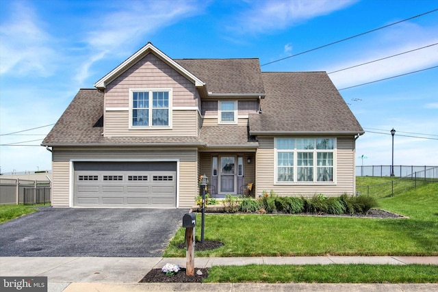305 Old Stone Way, York, PA 17406 - view of front of house with a garage, driveway, and roof with shingles