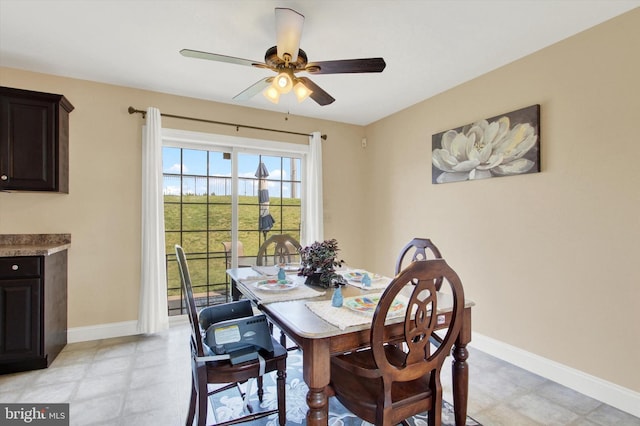 305 Old Stone Way, York, PA 17406 - dining room featuring a ceiling fan and baseboards