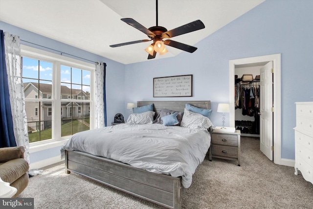 305 Old Stone Way, York, PA 17406 - bedroom with a walk in closet, carpet flooring, vaulted ceiling, a closet, and ceiling fan