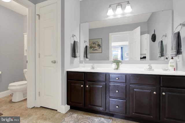 305 Old Stone Way, York, PA 17406 - bathroom featuring double vanity and toilet