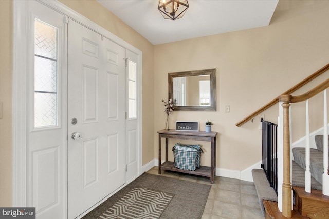 305 Old Stone Way, York, PA 17406 - entryway featuring stairs and baseboards
