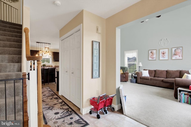 305 Old Stone Way, York, PA 17406 - hallway featuring stairway and light carpet