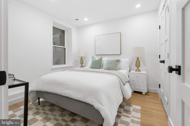 5128 5th St NW, Washington, DC 20011 - bedroom featuring light wood-type flooring, recessed lighting, and baseboards