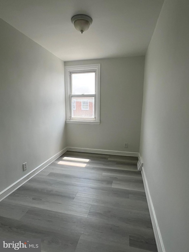 7233 Lynford St, Philadelphia, PA 19149 - unfurnished room with baseboards and wood finished floors