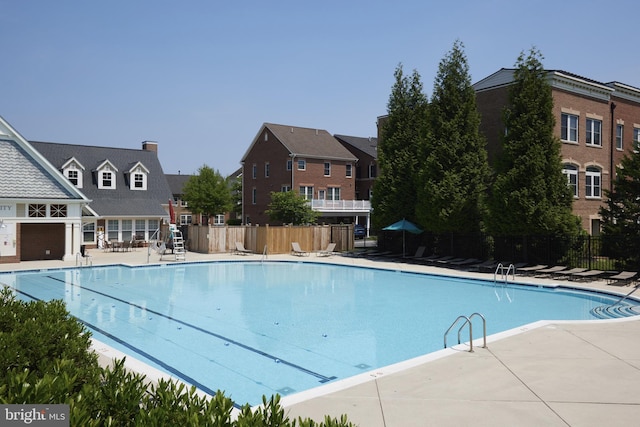 400 Blue Flax Pl, Gaithersburg, MD 20878 - community pool featuring a patio area and a residential view