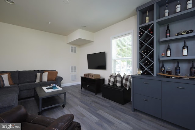400 Blue Flax Pl, Gaithersburg, MD 20878 - living room with wood finished floors and a bar