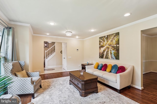8600 Fox Run, Potomac, MD 20854 - living room with wood finished floors, stairway, recessed lighting, and crown molding