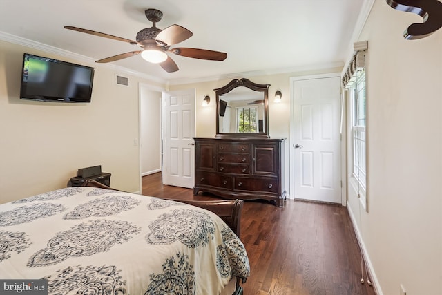 8600 Fox Run, Potomac, MD 20854 - bedroom with dark wood finished floors, crown molding, and ceiling fan