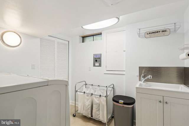 8600 Fox Run, Potomac, MD 20854 - bathroom featuring washer / clothes dryer and vanity