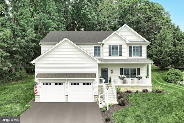 105 Fading Way, York, PA 17406 - traditional home featuring covered porch, driveway, a front lawn, stone siding, and a shingled roof