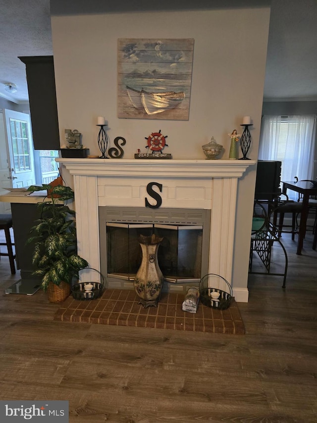 2800 Wakefield St, Colonial Beach, VA 22443 - detailed view of a brick fireplace and wood finished floors