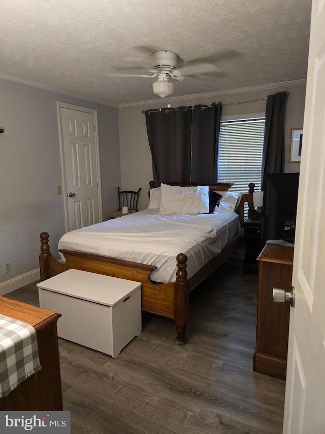 2800 Wakefield St, Colonial Beach, VA 22443 - bedroom featuring crown molding, wood finished floors, a textured ceiling, ceiling fan, and baseboards
