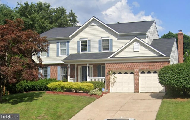 4 Discovery Ct, Baltimore, MD 21234 - traditional-style house with brick siding, a front yard, concrete driveway, a garage, and a porch