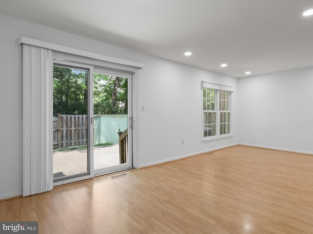 9664 Masterworks Dr, Vienna, VA 22181 - empty room with wood finished floors and recessed lighting