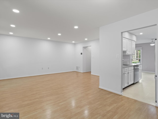 9664 Masterworks Dr, Vienna, VA 22181 - unfurnished living room with light wood-style floors, recessed lighting, and ceiling fan