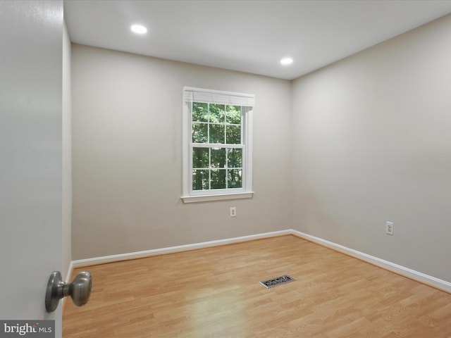9664 Masterworks Dr, Vienna, VA 22181 - empty room with wood finished floors and recessed lighting
