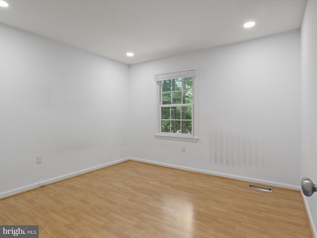 9664 Masterworks Dr, Vienna, VA 22181 - spare room featuring wood finished floors and recessed lighting
