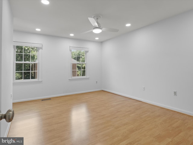 9664 Masterworks Dr, Vienna, VA 22181 - spare room featuring plenty of natural light, recessed lighting, light wood-type flooring, and ceiling fan