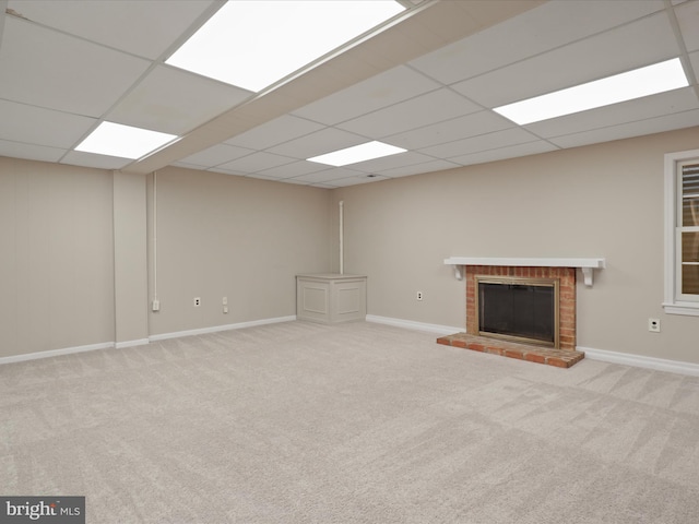 9664 Masterworks Dr, Vienna, VA 22181 - unfurnished living room with carpet flooring, a brick fireplace, and a drop ceiling