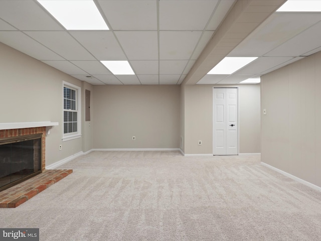 9664 Masterworks Dr, Vienna, VA 22181 - unfurnished living room with a paneled ceiling, carpet flooring, and a brick fireplace