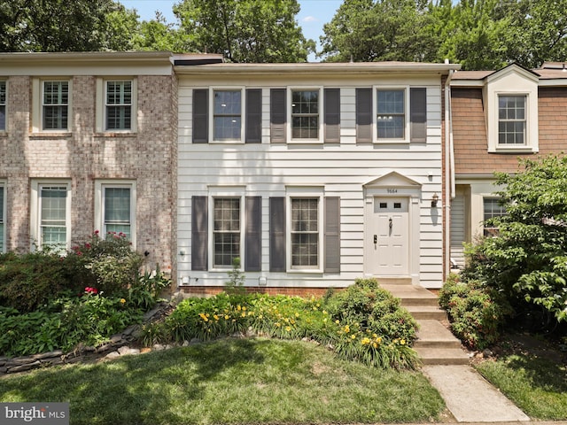 9664 Masterworks Dr, Vienna, VA 22181 - view of front facade with a front yard