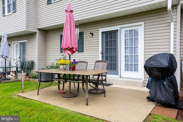 1027 Fredrick Blvd, Reading, PA 19605 - view of patio with outdoor dining space, central air condition unit, and area for grilling
