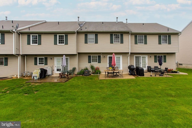 1027 Fredrick Blvd, Reading, PA 19605 - rear view of property featuring a patio, a lawn, and central AC unit