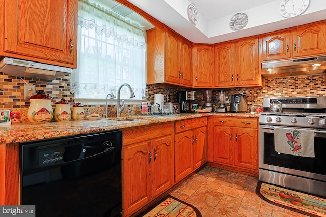1027 Fredrick Blvd, Reading, PA 19605 - kitchen featuring stainless steel range with gas cooktop, dishwasher, under cabinet range hood, a sink, and tasteful backsplash