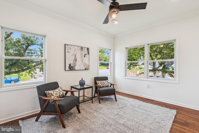 2142 N Dinwiddie St, Arlington, VA 22207 - sitting room featuring healthy amount of natural light, ornamental molding, wood finished floors, and a ceiling fan