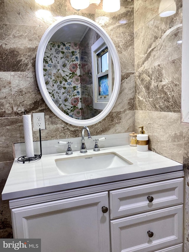 220 N 3rd St, Millville, NJ 08332 - bathroom featuring tile walls, vanity, and tasteful backsplash