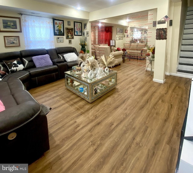 220 N 3rd St, Millville, NJ 08332 - living area with wood finished floors, stairway, and baseboards