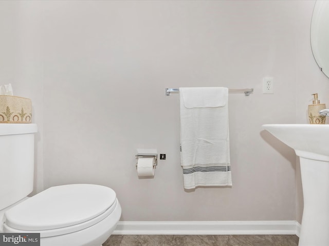 7732 Rotherham Dr, Hanover, MD 21076 - half bath with toilet and baseboards