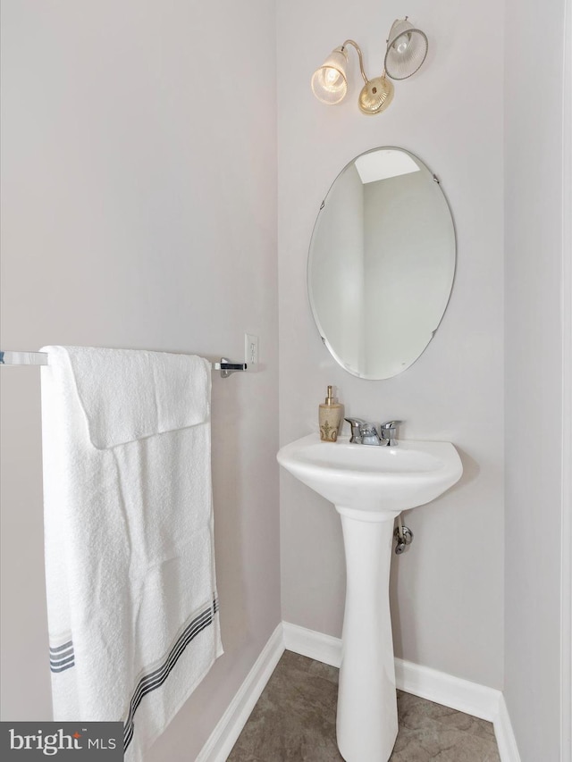 7732 Rotherham Dr, Hanover, MD 21076 - bathroom with a sink and baseboards
