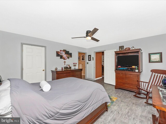 7732 Rotherham Dr, Hanover, MD 21076 - bedroom featuring wood finished floors and ceiling fan