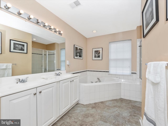7732 Rotherham Dr, Hanover, MD 21076 - full bathroom with a stall shower, double vanity, and a bath
