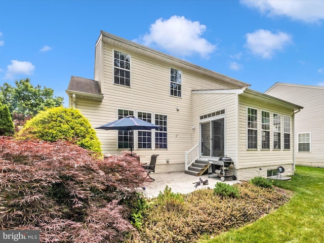 7732 Rotherham Dr, Hanover, MD 21076 - rear view of property with a patio and entry steps