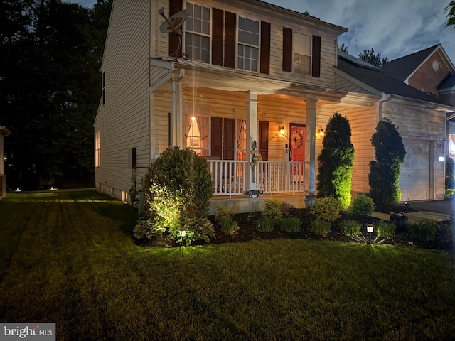 7732 Rotherham Dr, Hanover, MD 21076 - view of front facade with covered porch, a front lawn, and an attached garage