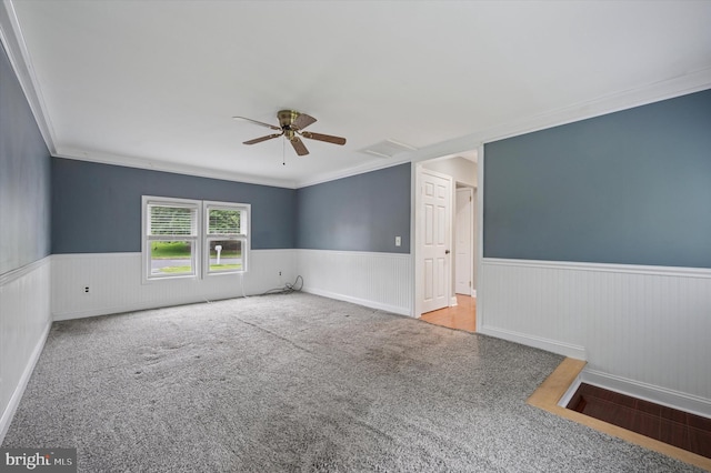 4410 Pilgrim Ln, Upper Chichester, PA 19061 - carpeted empty room featuring a wainscoted wall, a ceiling fan, and crown molding