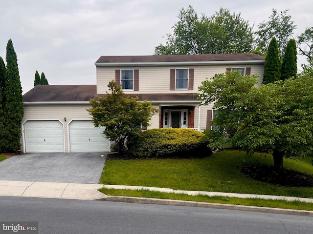 28 Willow Way Dr, Enola, PA 17025 - view of front of home featuring asphalt driveway, a garage, and a front lawn