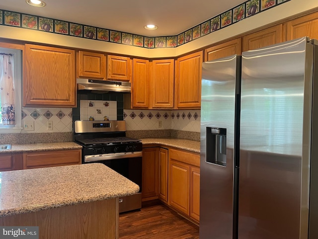 28 Willow Way Dr, Enola, PA 17025 - kitchen featuring appliances with stainless steel finishes, under cabinet range hood, dark wood finished floors, brown cabinets, and recessed lighting