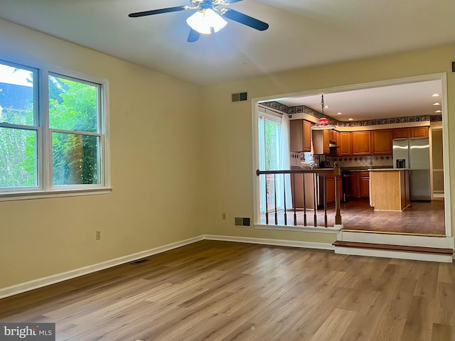28 Willow Way Dr, Enola, PA 17025 - unfurnished living room with wood finished floors, ceiling fan, and recessed lighting