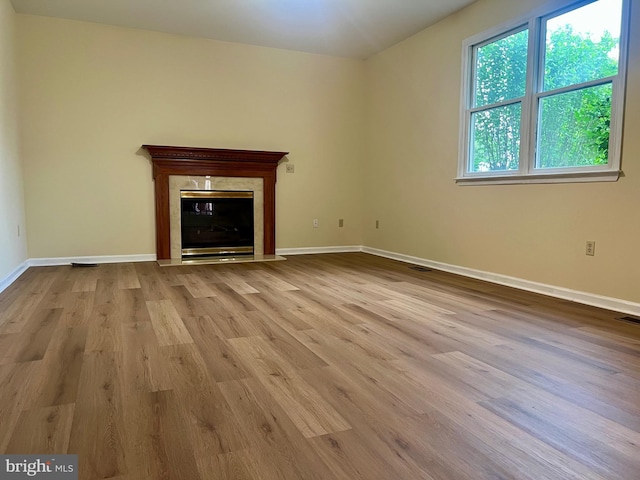 28 Willow Way Dr, Enola, PA 17025 - unfurnished living room with wood finished floors and a premium fireplace