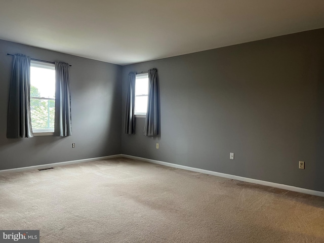 28 Willow Way Dr, Enola, PA 17025 - empty room with healthy amount of natural light and carpet flooring