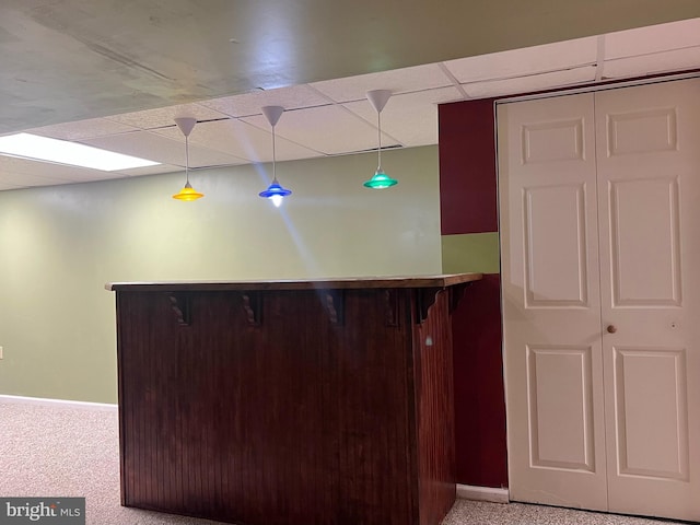 28 Willow Way Dr, Enola, PA 17025 - kitchen featuring a drop ceiling, a kitchen bar, hanging light fixtures, and carpet floors
